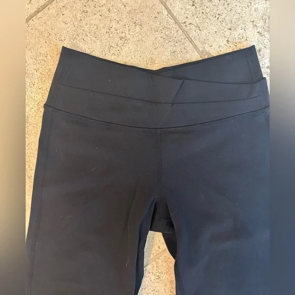 Lululemon Criss Cross Waist Flared Women's Black Leggings Size 4 Tall - Picture 2 of 5